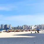 Apartamento Dulce Pitangueiras Guarujá com varanda